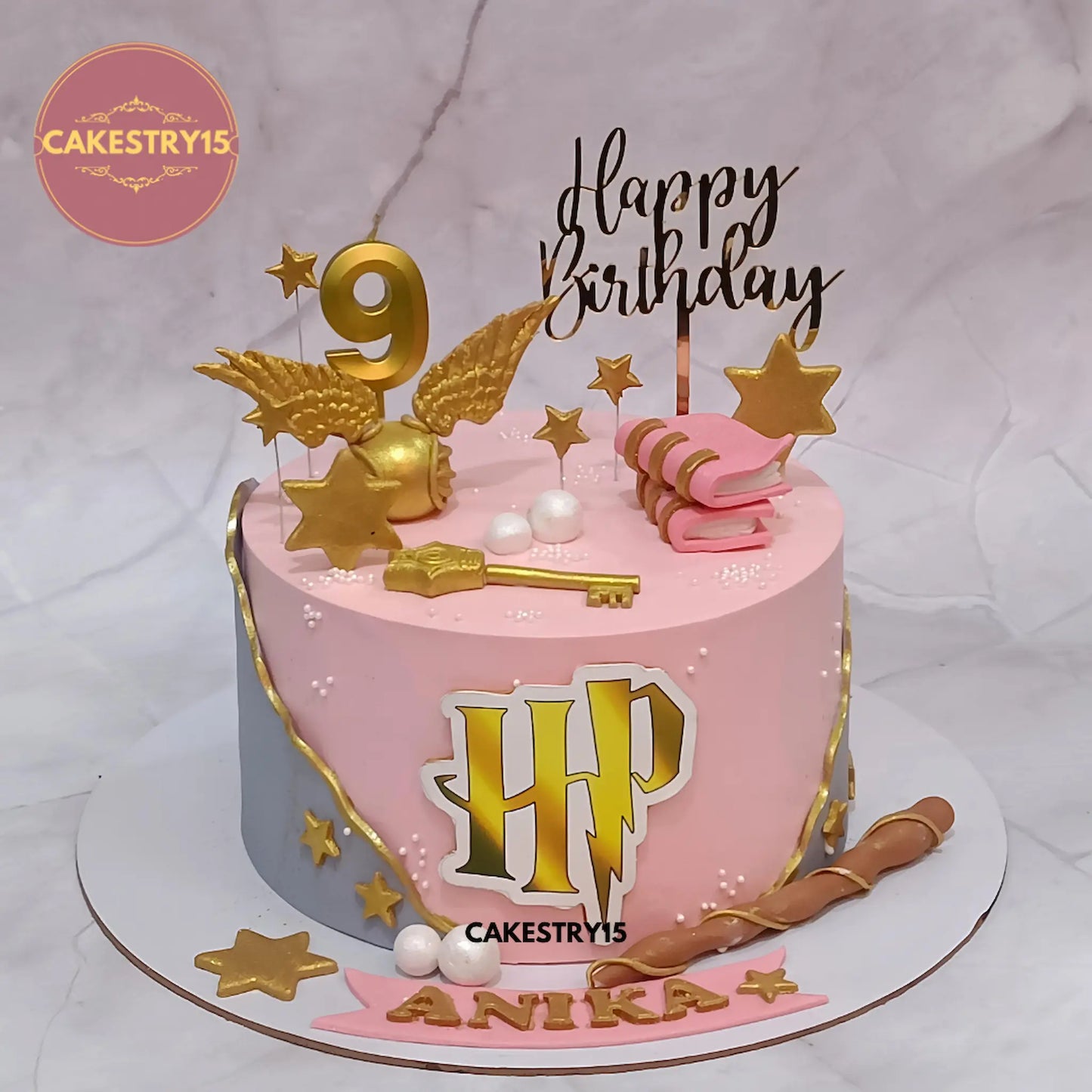 1.5kg chocolate Harry Potter theme birthday cake with wings, books, wand, key, stars by Cakestry15 Noida