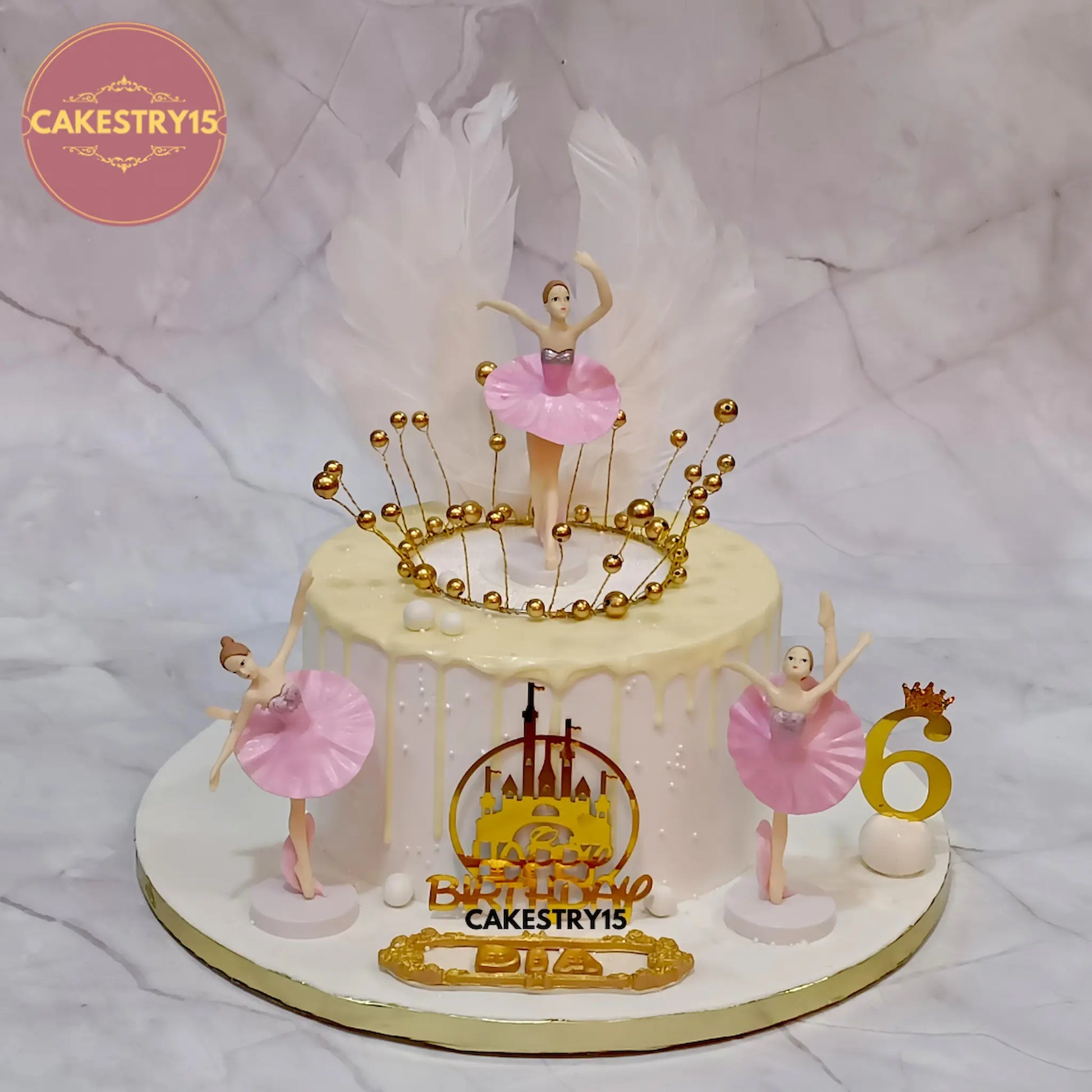 2kg chocolate ballerina crown cake with feather wings and chocolate drip for Dia’s 6th birthday by Cakestry15