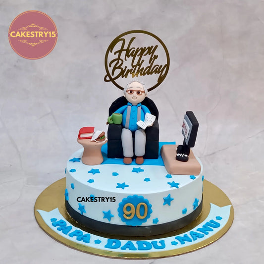 Chocolate 1kg 90th birthday cake with custom grandfather figurine, sofa, TV, and golden stars by cakestry15