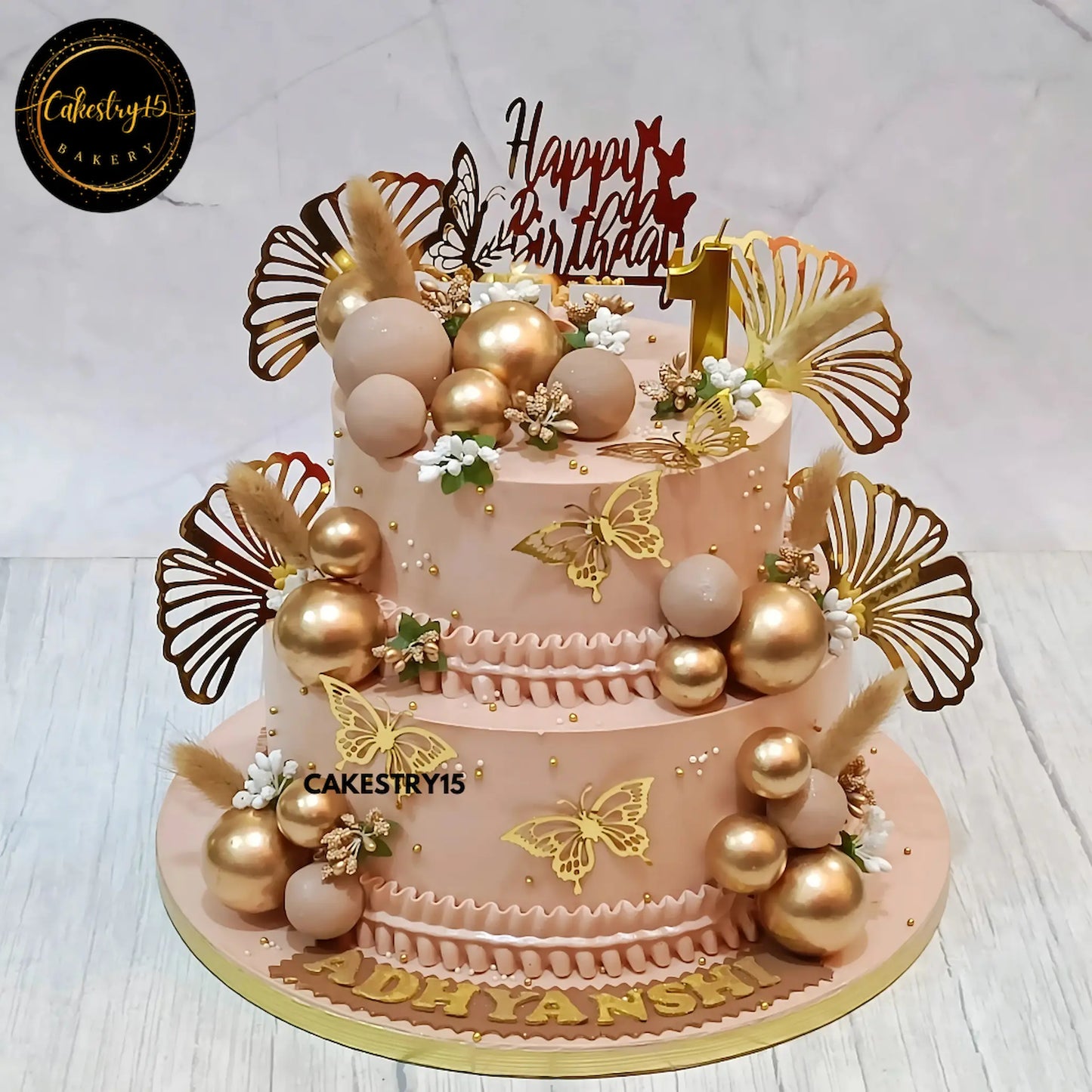 Golden Elegance Birthday Cake,2kg pineapple first birthday cake for a girl by cakestry15 noida,cake full image