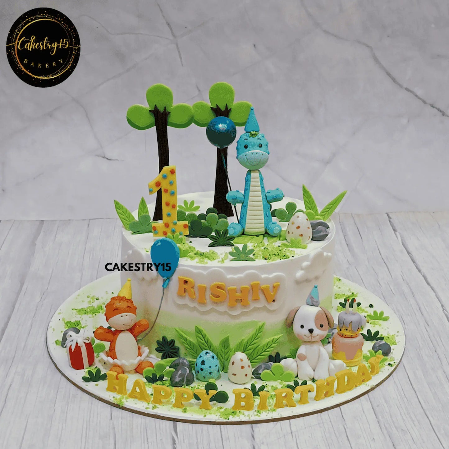 Little Dino Adventure Cake,1.5kg white forest first birthday cake for a boy by cakestry15 noida,cake full image