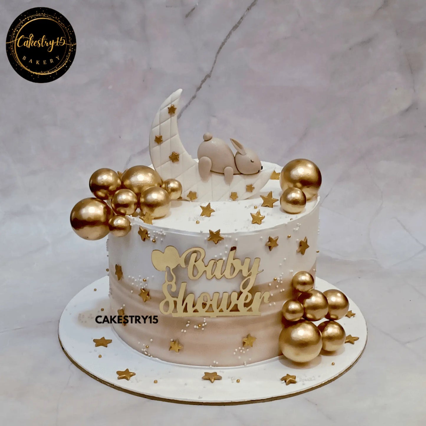 Moonlit Bunny Baby Shower Cake,1kg butterscotch flavour baby announcement theme cake by cakestry15 noida, cake full image