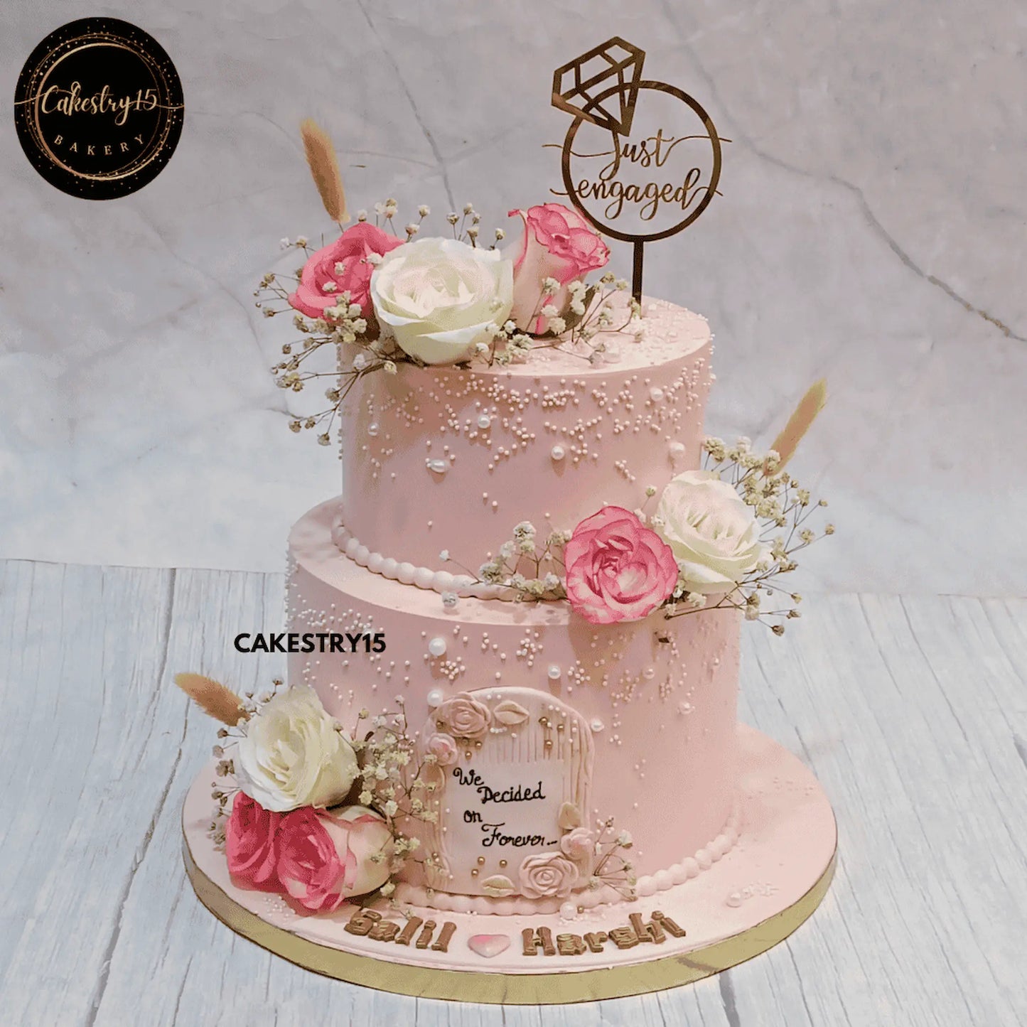 Pink Elegance Just Engaged Cake,3kg pineapple by cakestry15 noida,cake full image,floral cakes