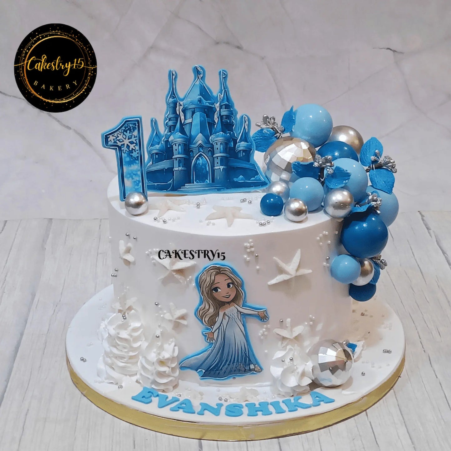 Snow Queen’s Bliss 2kg black forest first birthday Cake by cakestry15,noida,cake full image1