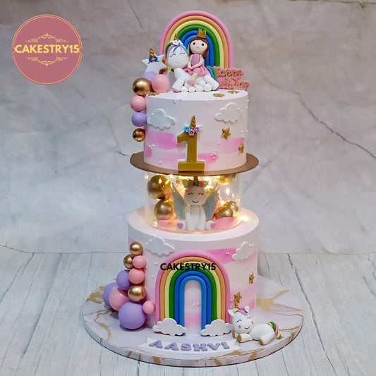 Aashvi’s 3kg choco vanilla first birthday unicorn cake with fondant rainbows and topper by cakestry15