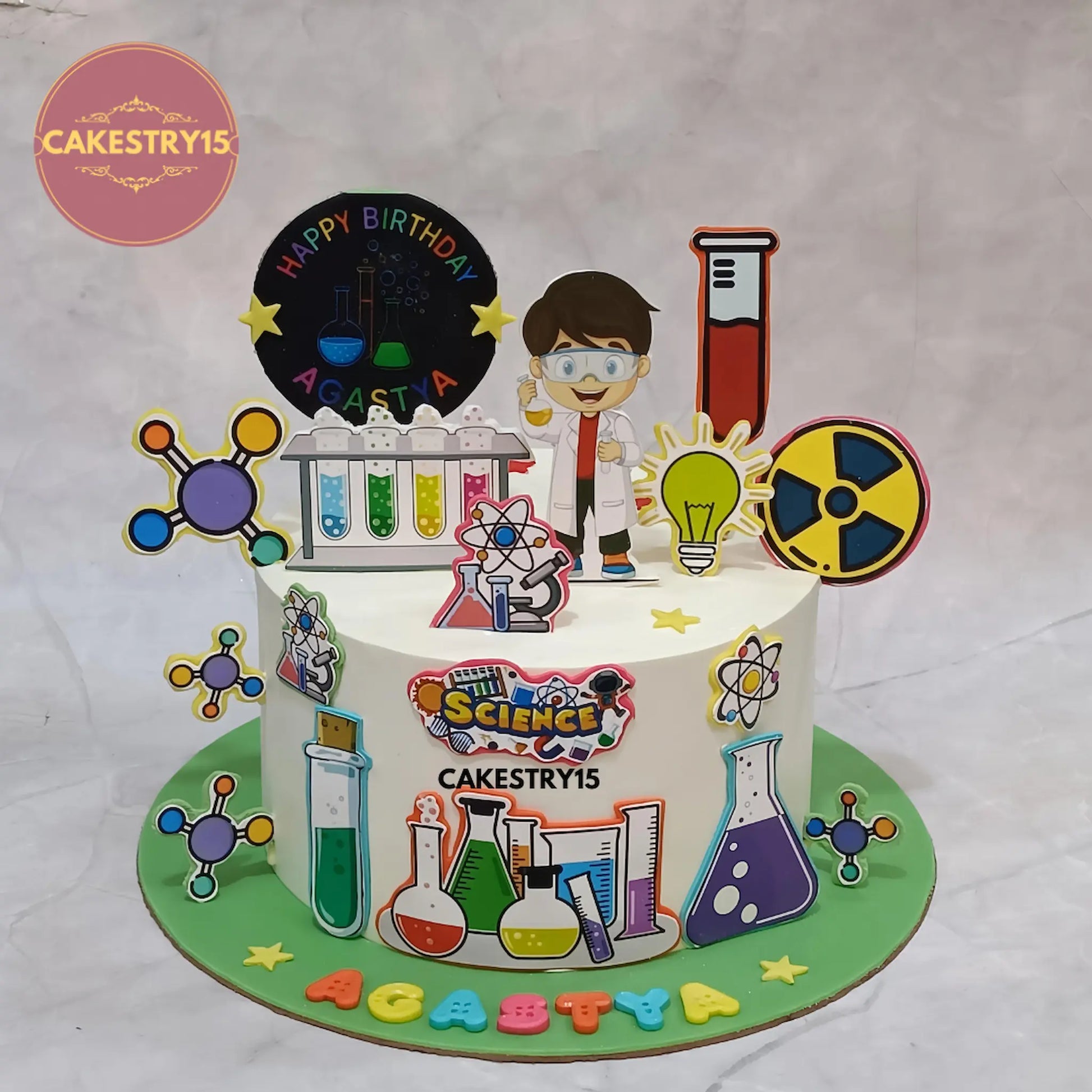 2kg chocolate science theme birthday cake from Cakestry15 in Noida with edible boy in lab coat, beakers, test tubes, and science formulas