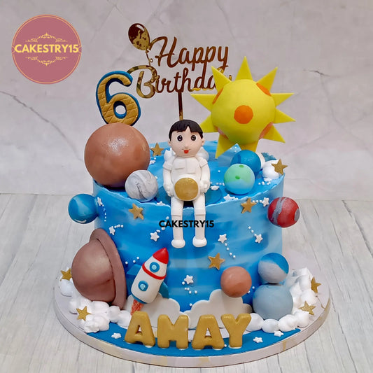 Amay's 2kg chocolate space theme birthday cake with planets, spaceship, and cloud detailing by cakestry15
