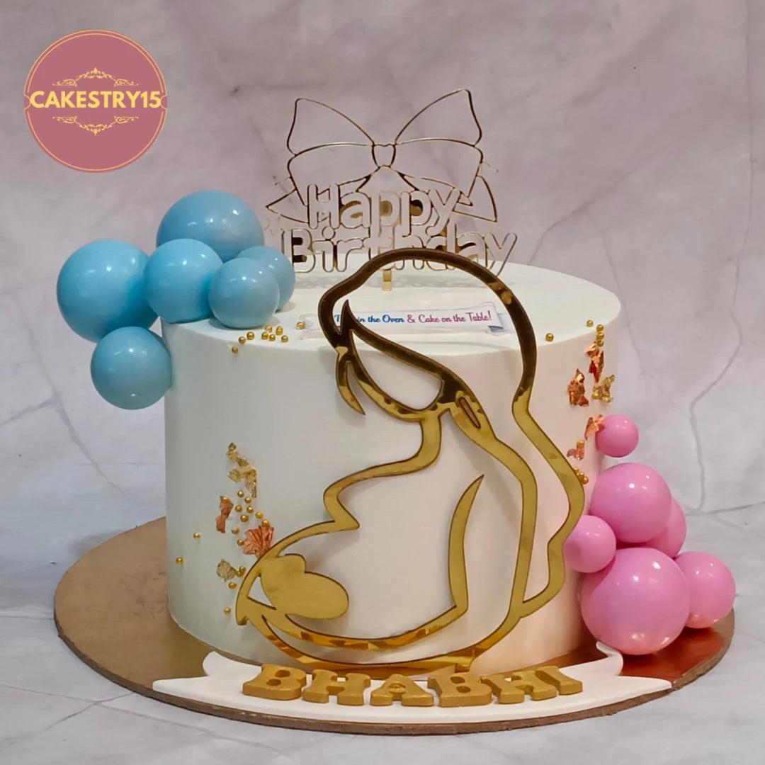 Elegant kids birthday cake inspired baby shower theme cake Noida featuring a pregnant mom topper with pink and blue faux balls, handcrafted as premium eggless cakes.