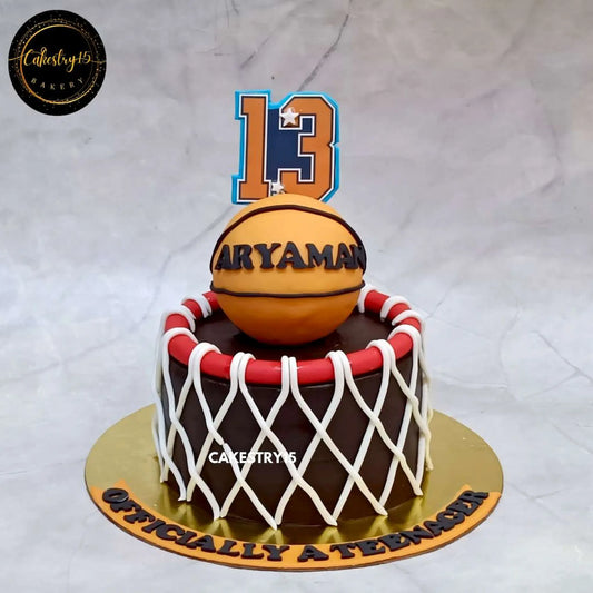 One kg chocolate basketball-themed birthday cake with white fondant net design and edible basketball on top for Aryaman’s 13th birthday by cakestry15 noida, best cakes noida