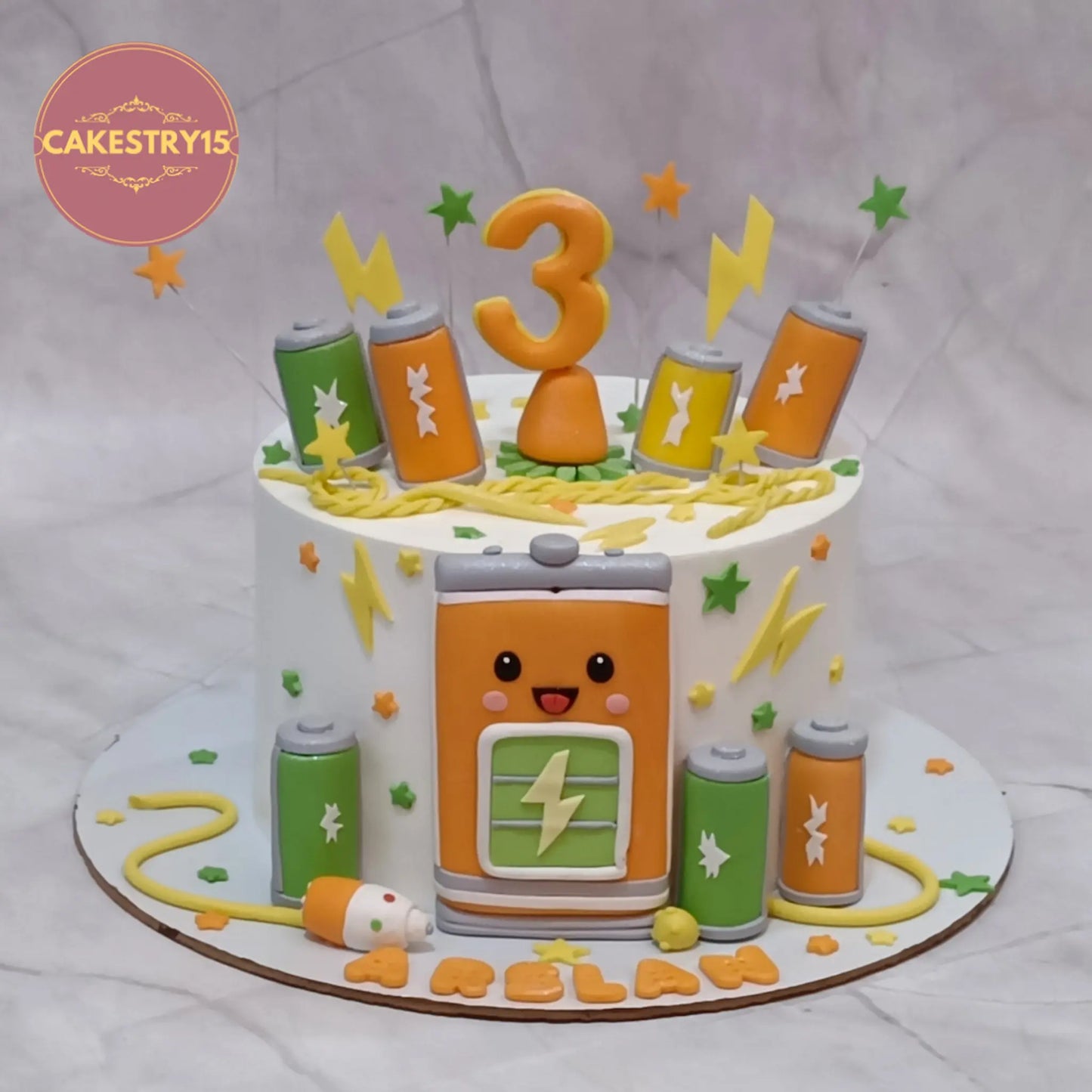 Battery theme kids birthday cake for boys, a creative theme cake Noida design from our range of premium eggless cakes.