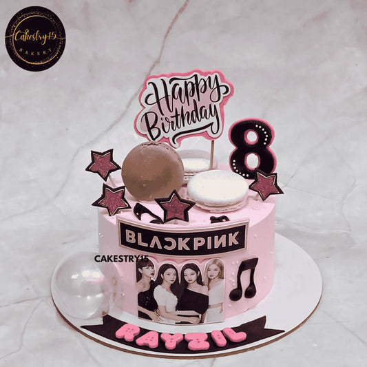 Blackpink theme 8th birthday cake in chocolate flavor with edible band photo and fondant macarons by cakestry15,best bakery noida
