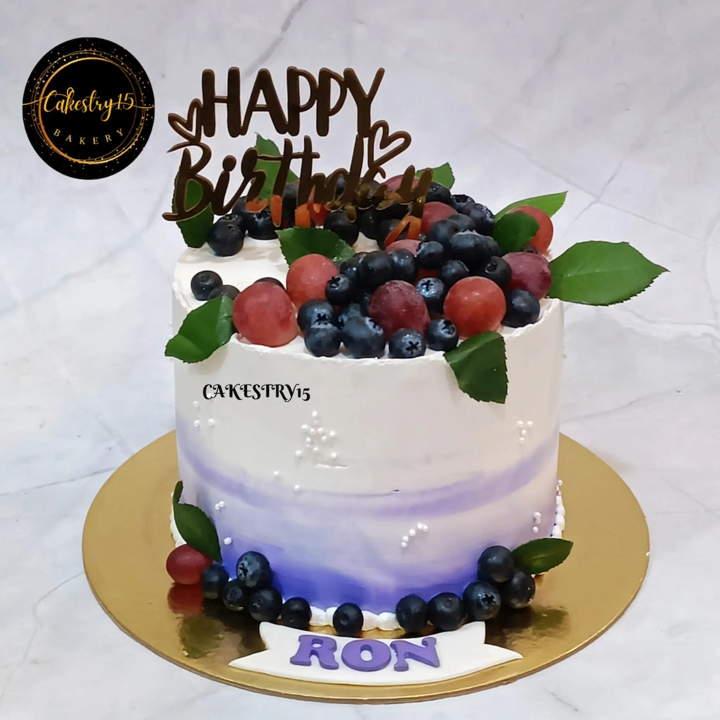 Blueberry Fresh Fruit Birthday Cake featuring fresh fruit toppings, perfect as an eggless kids birthday cake and premium theme cake Noida families love.