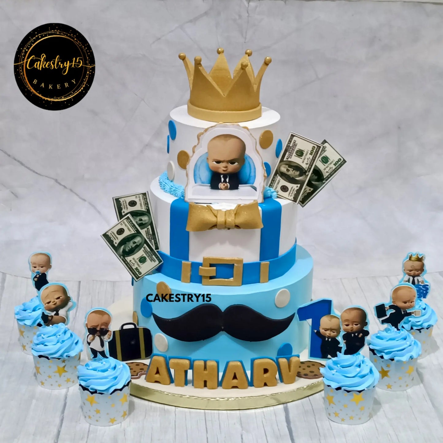3-tier 4kg Boss Baby theme chocolate cake with fondant crown and toppers from Cakestry15 Noida