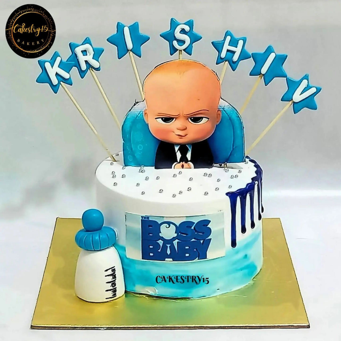 Boss Baby theme eggless first birthday cake for kids in chocolate butterscotch flavour by Cakestry15 Noida