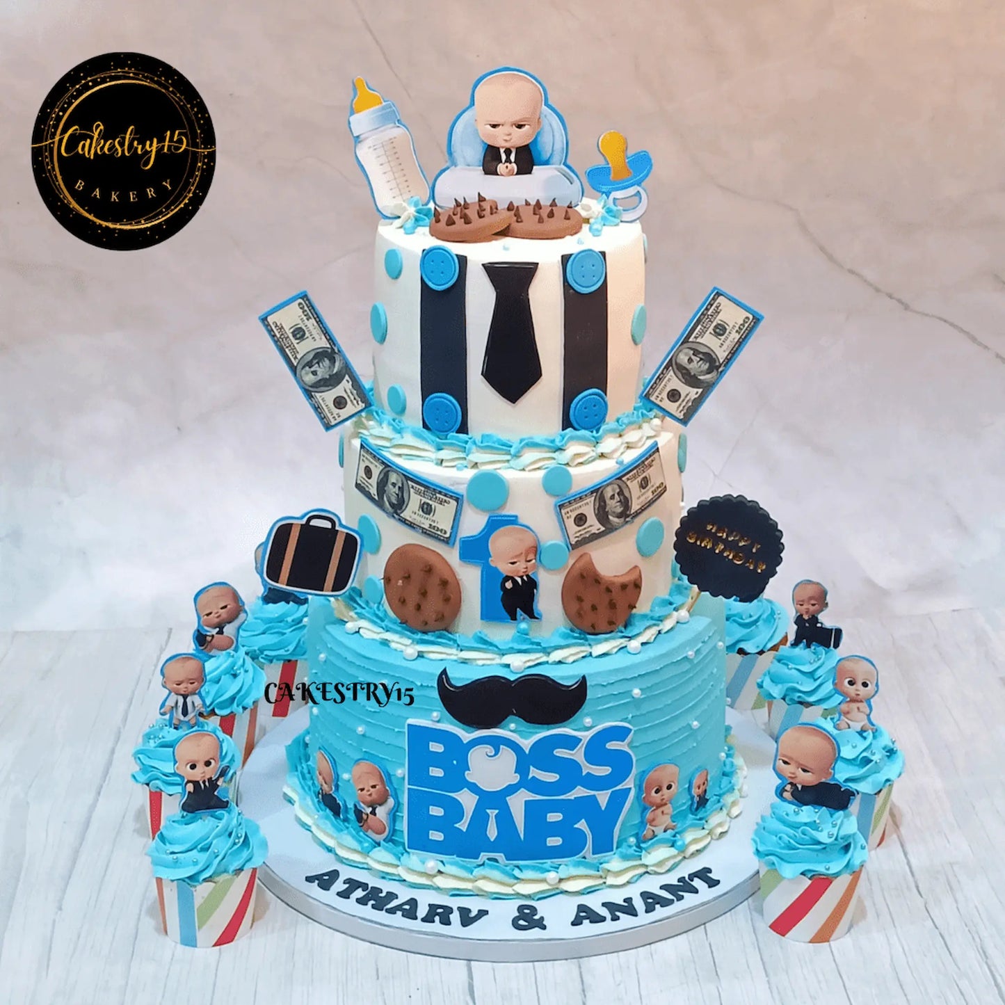 Boss Baby theme eggless twin first birthday cake with 3 tiers and chocolate flavour made by Cakestry15 in Noida