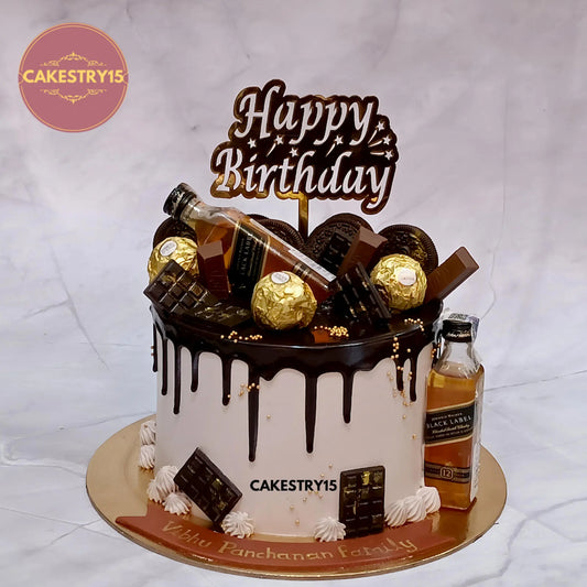 1kg chocolate drip cake with Black Label miniatures, Ferrero Rocher, KitKat, Oreo from Cakestry15