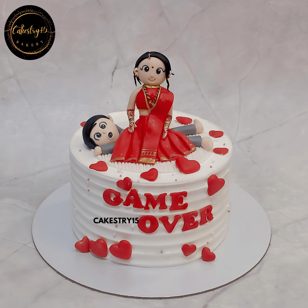 Bride to be Game Over blueberry cake with bride figurine in saree sitting on groom by cakestry15,best bakery noida