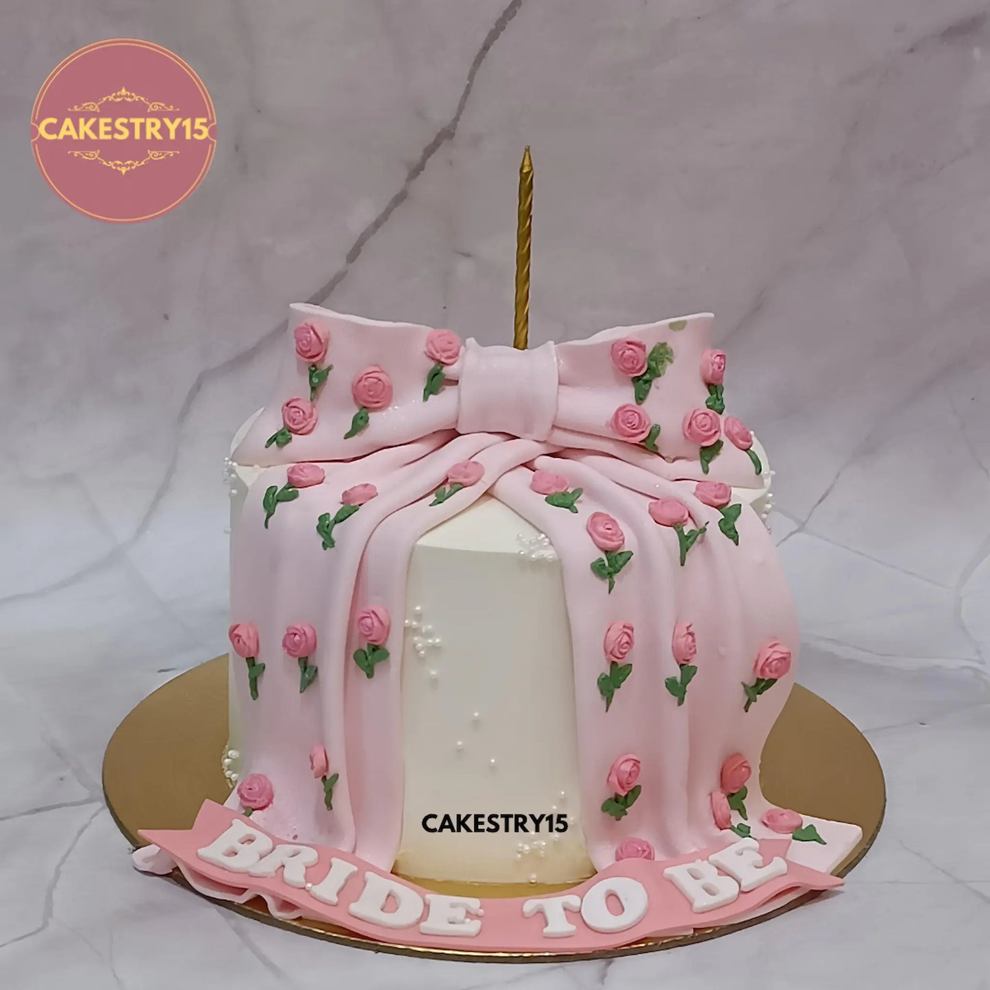 Bride to be theme eggless truffle celebration cake with pink bow and fondant rosettes by Cakestry15 Noida