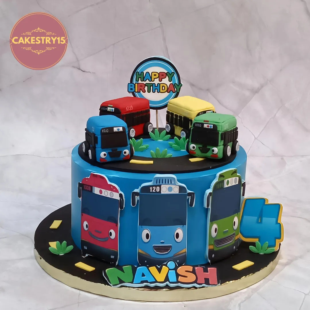 Bus theme kids birthday cake with fondant road and buses, premium eggless cakes and theme cake Noida for 4th birthday celebrations.
