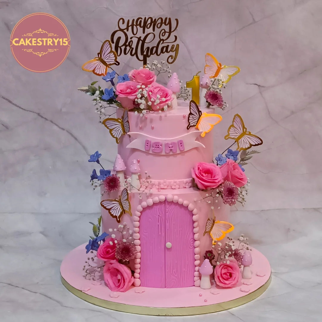 A butterfly and fresh roses kids birthday cake with pink icing, theme cake Noida styling and an eggless cakes finish.