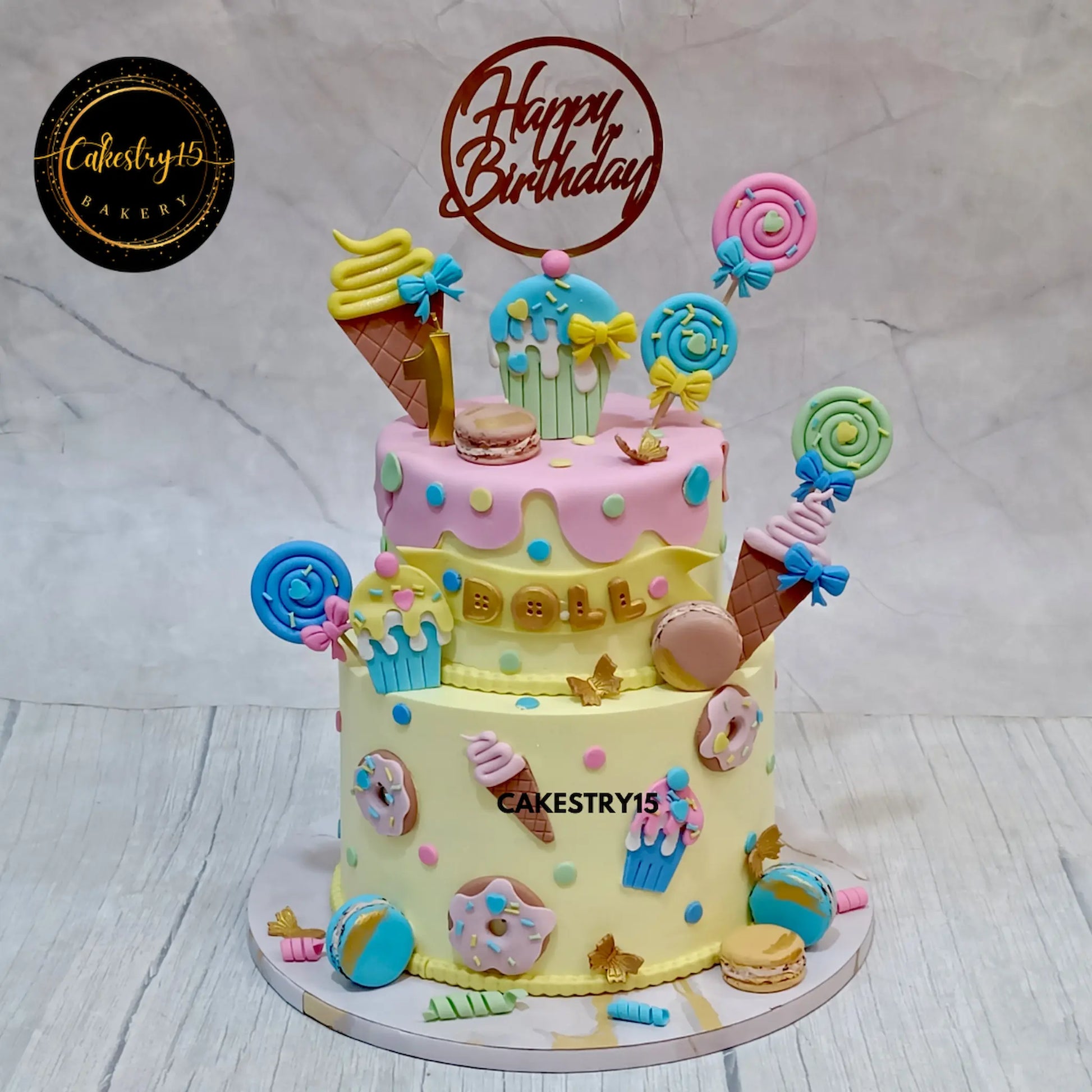 Candyland 3kg 2-tier eggless chocolate birthday cake with fondant decorations from Cakestry15
