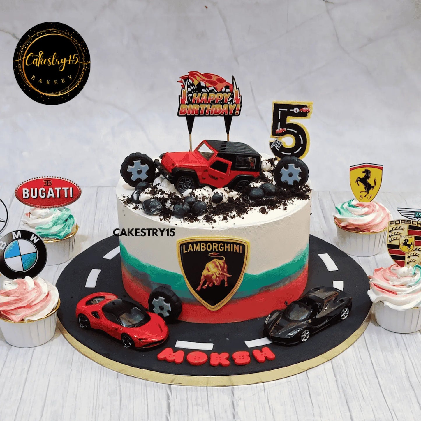 car theme 2kg Black Forest cake with Thar and Ferrari toppers for Moksh’s 5th birthday by Cakestry15