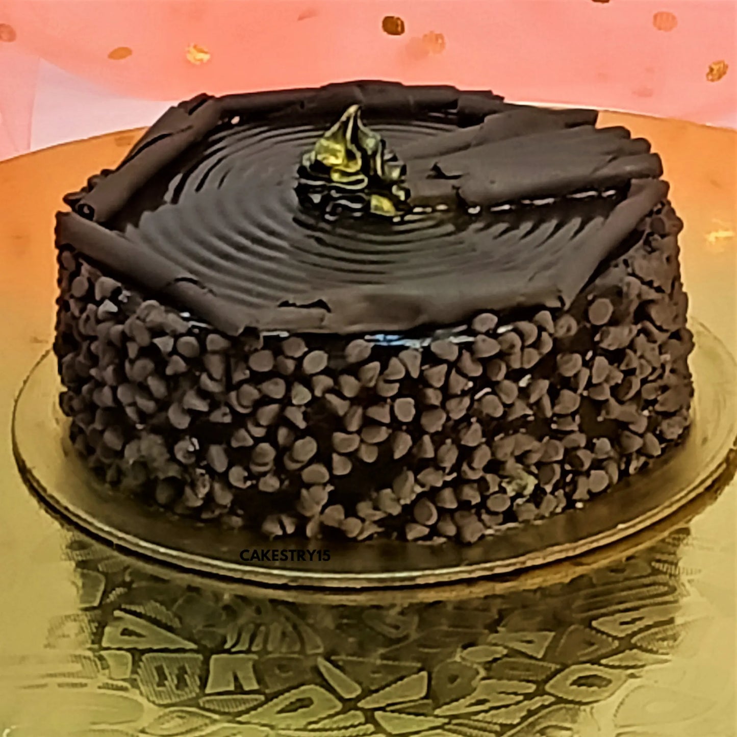 1kg choco chip cake layered with ganache and chocolate chips, topped with chocolate garnish by cakestry15 noida