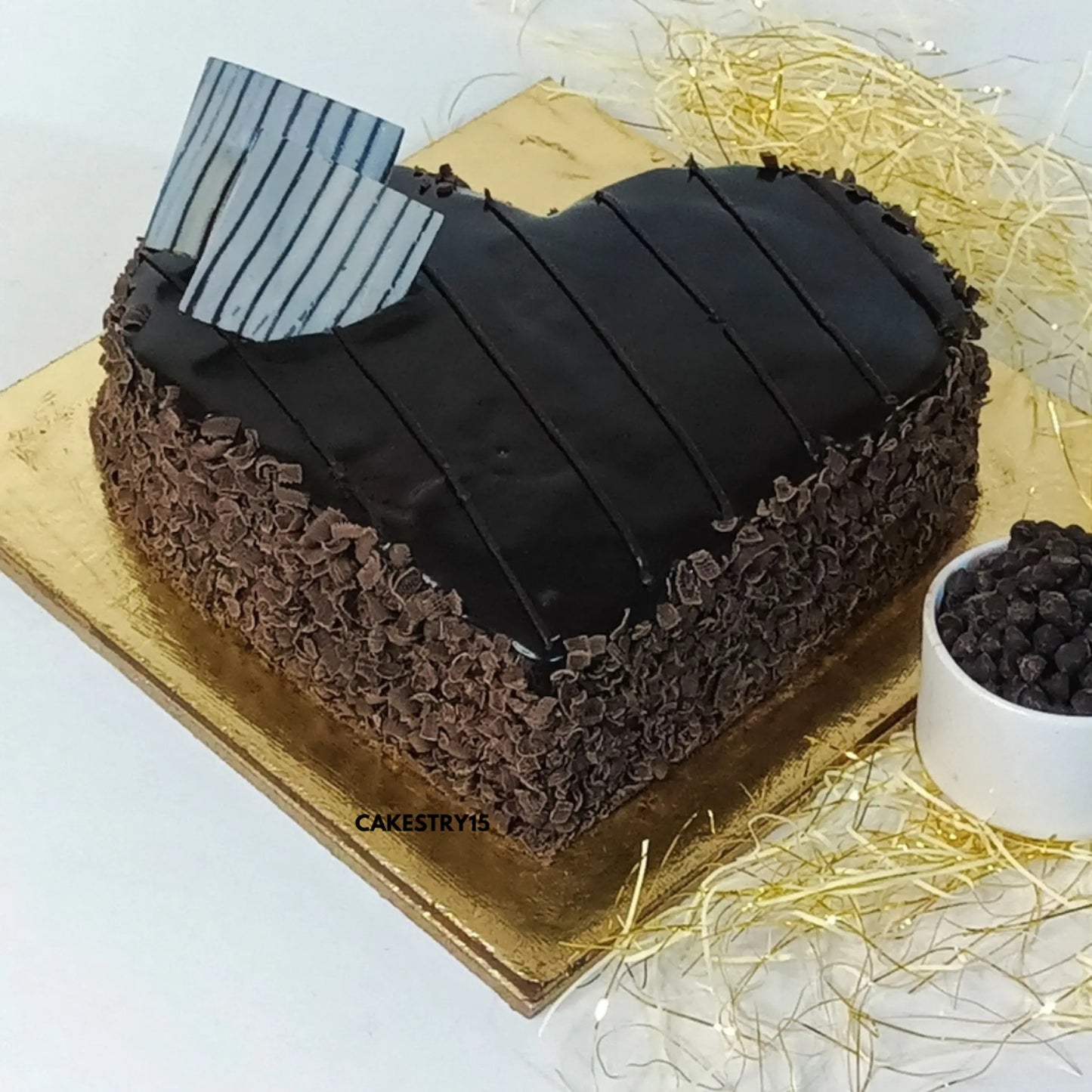 1kg heart-shaped choco chip cake with ganache and chocolate garnish from Cakestry15