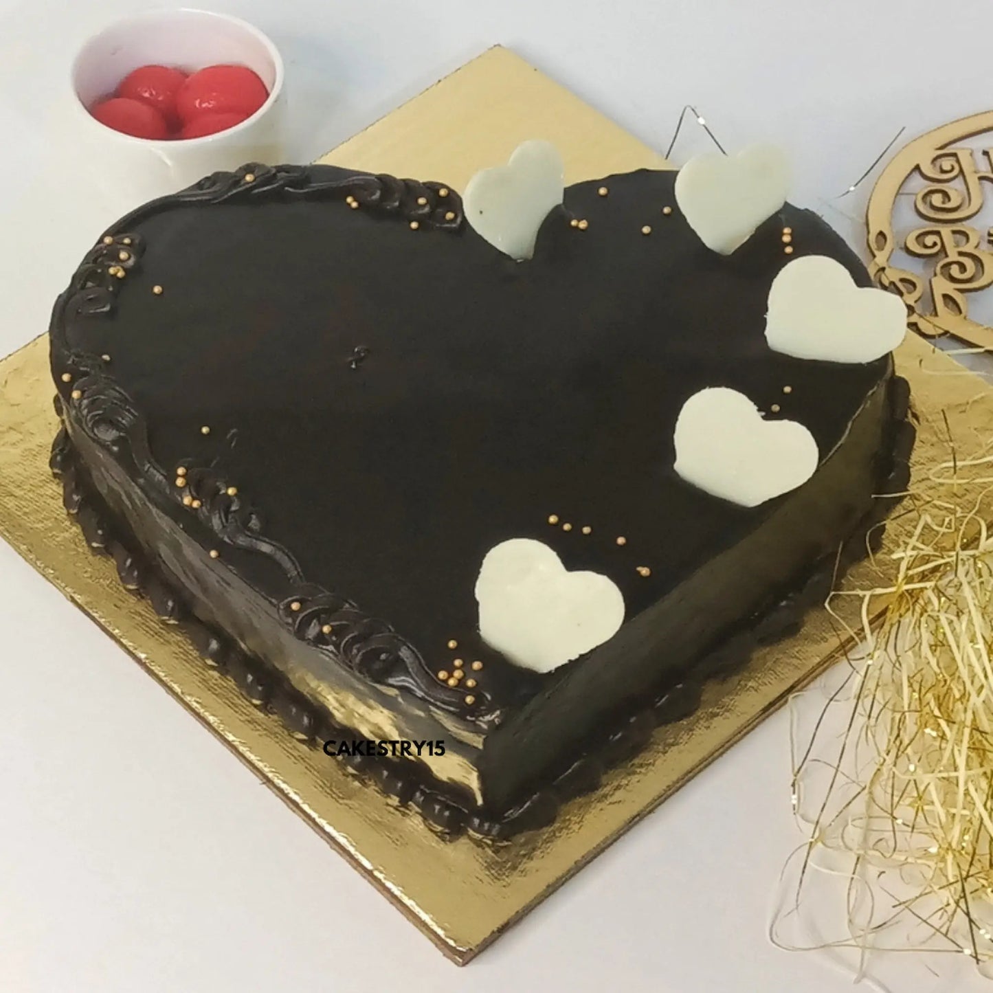 1kg chocolate ganache cake with white chocolate hearts from Cakestry15