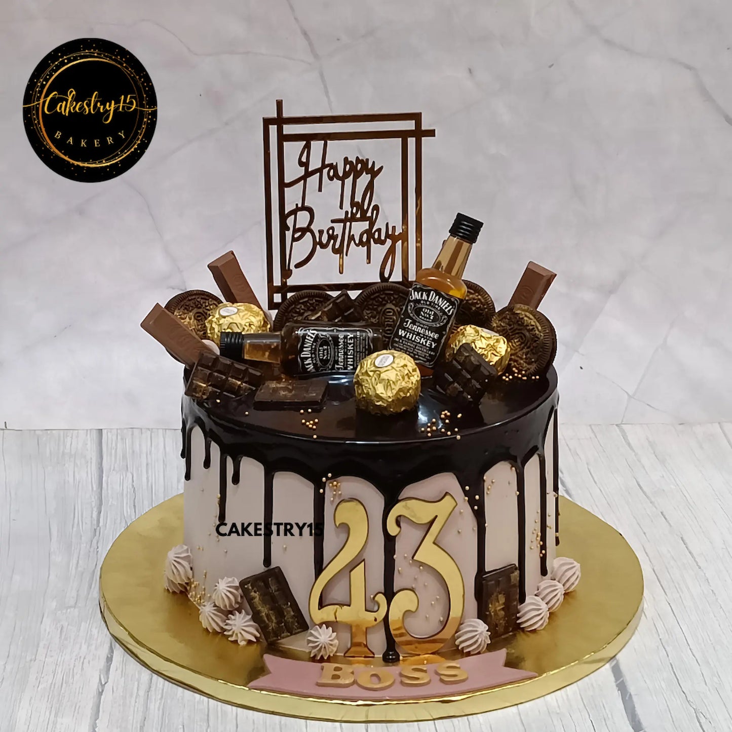 2kg chocolate birthday cake with Jack Daniel’s miniatures and assorted chocolates, perfect for men and corporate birthdays