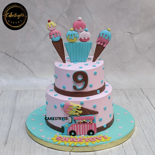2-tier pink icing chocolate Candyland cake for 9th birthday with candy bus and waffle cones by cakestry15,best bakery in noida