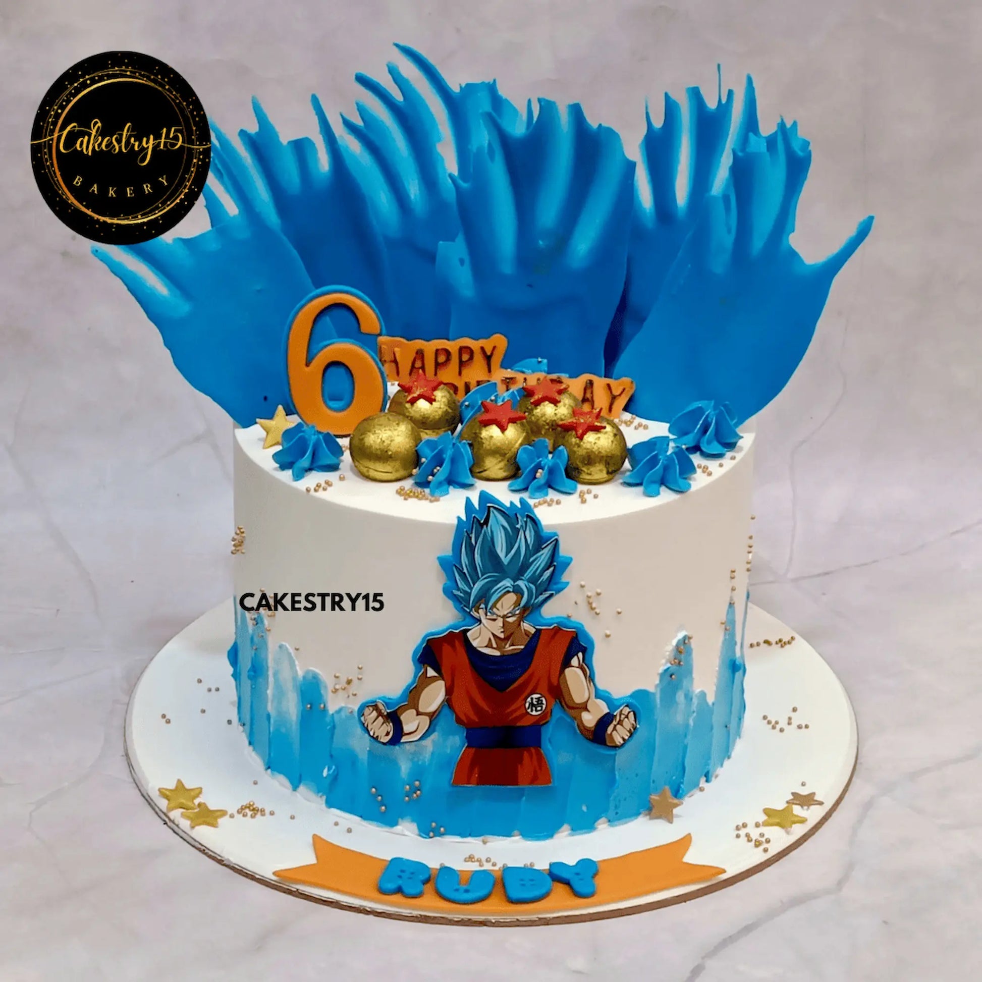 2kg black forest Dragonball-themed birthday cake for Rudy with edible image and Chocolate balls on top,best bakery noida,cakestry15