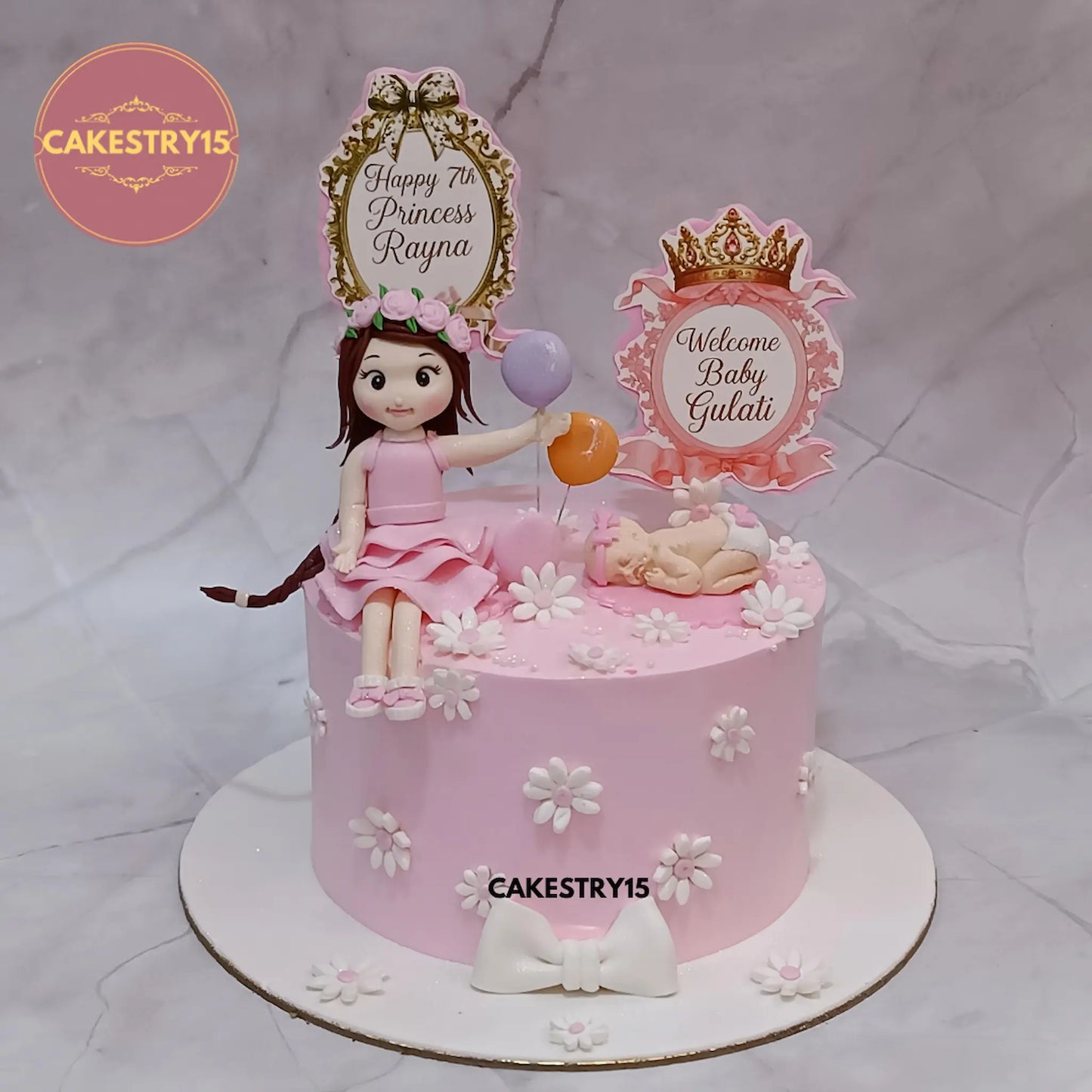 1kg choco vanilla dual theme welcome baby and 7th birthday cake by Cakestry15 Noida