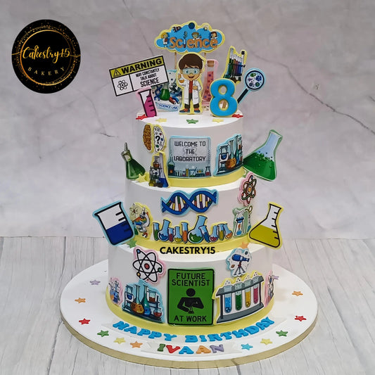 Science-themed 3-tier chocolate cake for Ivaan’s 8th birthday featuring edible images and lab elements
