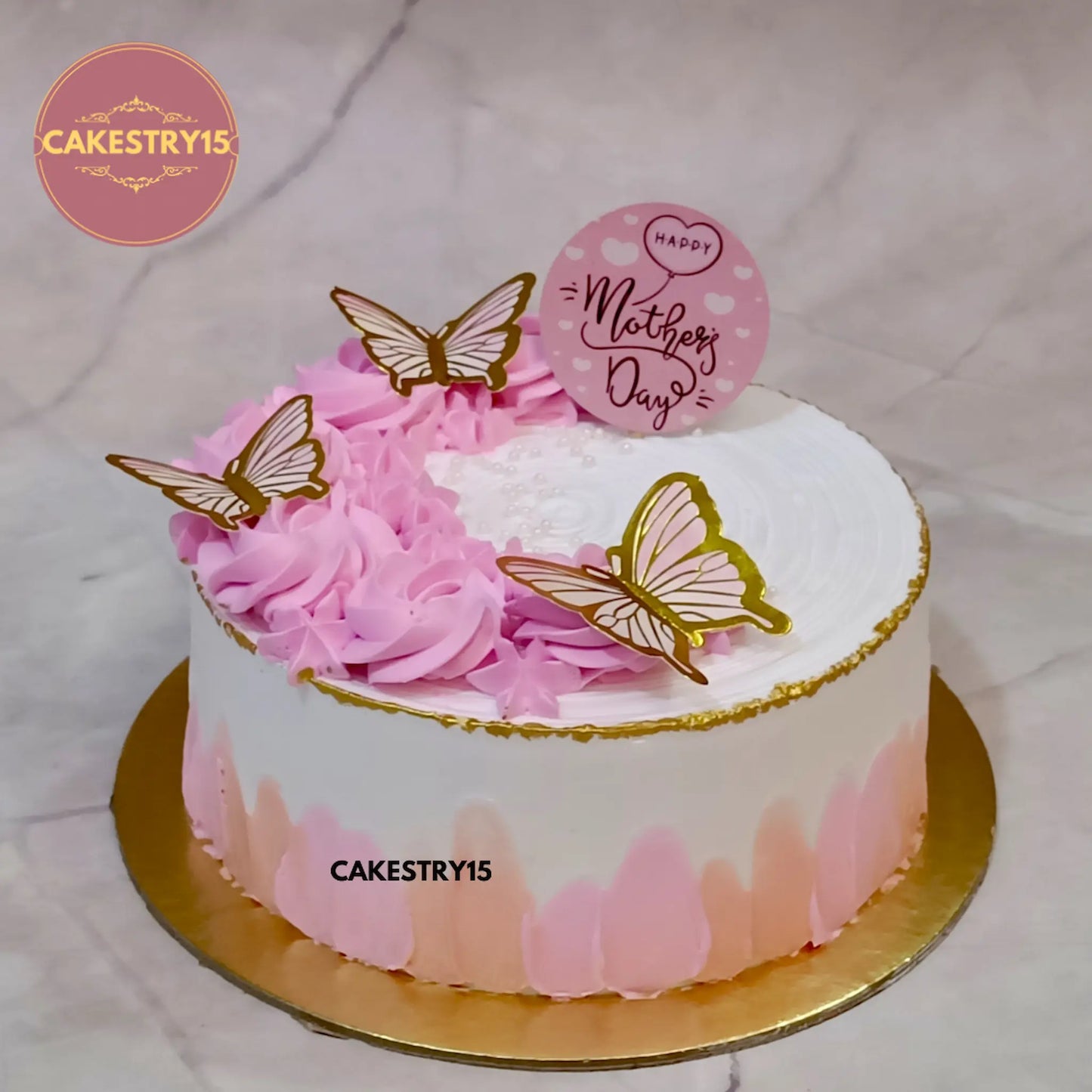Golden Blush eggless butterscotch birthday cake with ivory base and pink orange palette design by Cakestry15 in Noida