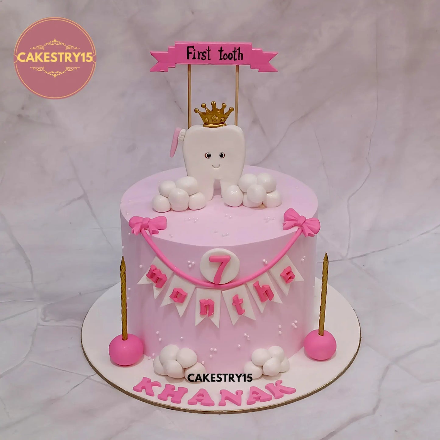 Halfway to One 1kg pineapple cake with fondant tooth, clouds, banner, and golden candles from Cakestry15