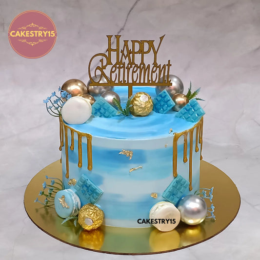 1.5kg chocolate retirement cake with golden drip, macarons, Ferrero Rocher and chocolates from Cakestry15 Noida