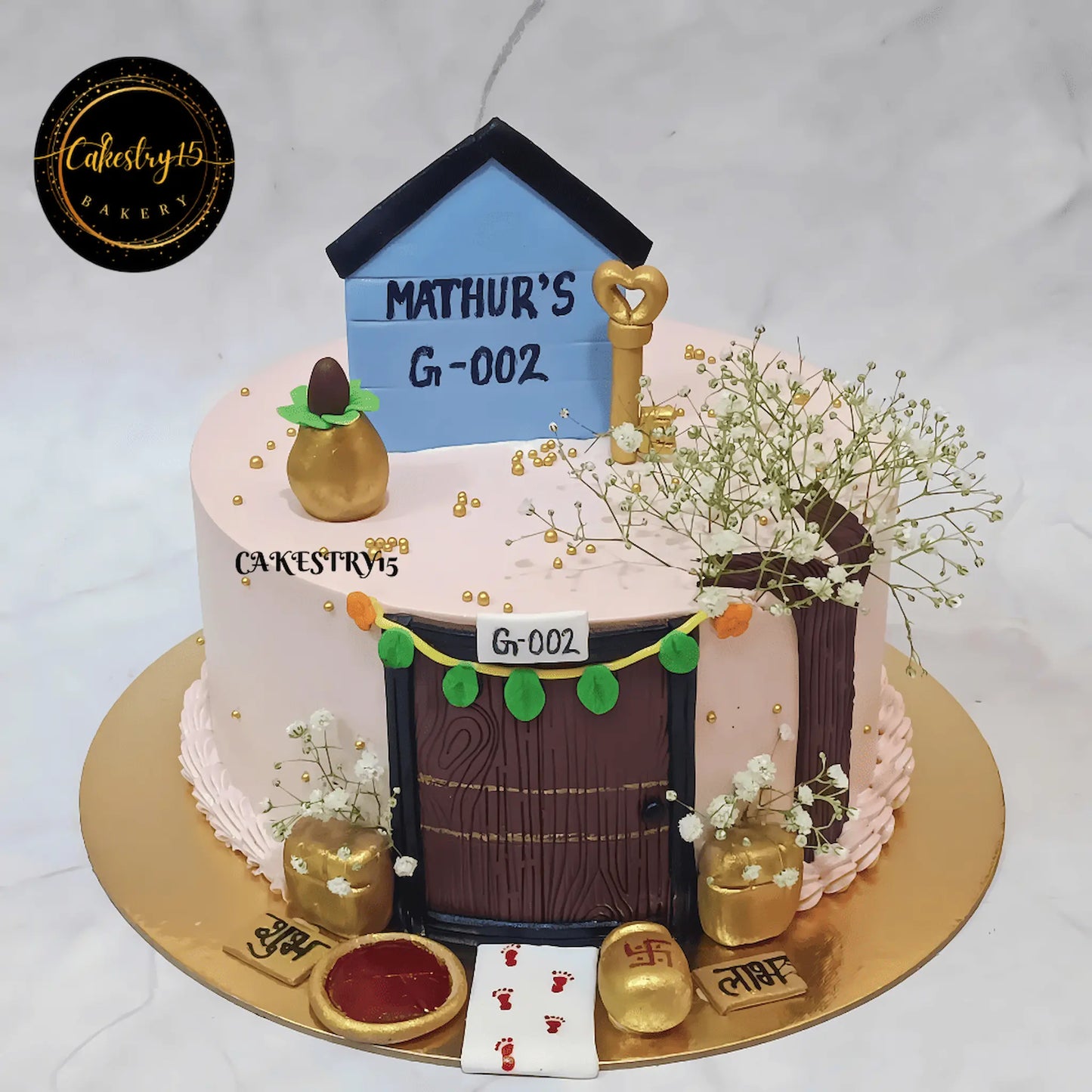 2kg black forest housewarming cake with fondant house, keys, and kalash from Cakestry15