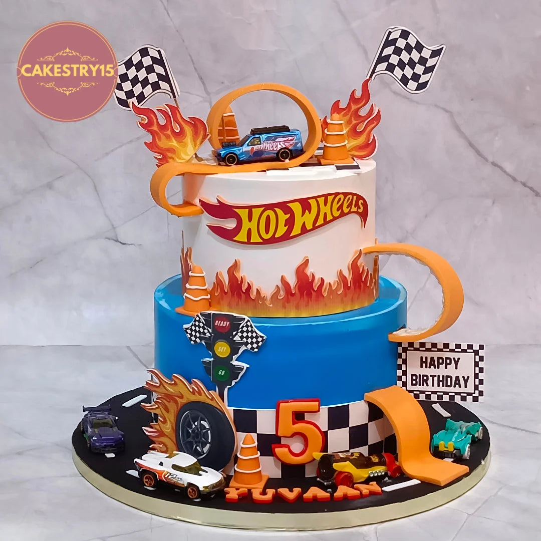 Hot Wheels racing kids birthday cake with a racetrack design from a theme cake Noida bakery offering premium eggless cakes.