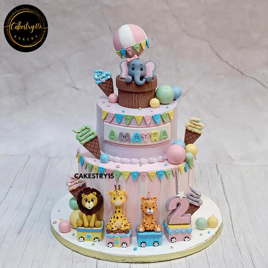 4kg jungle theme birthday cake with elephant in balloon and animal train by cakestry15 noida