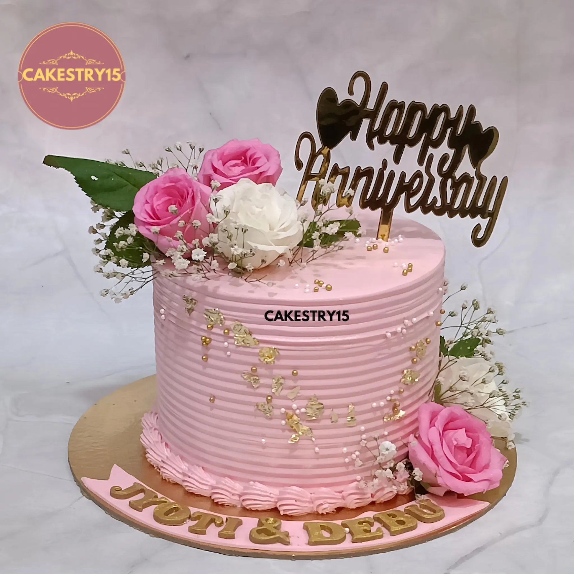 1kg strawberry anniversary cake topped with roses and baby breath from Cakestry15 Noida