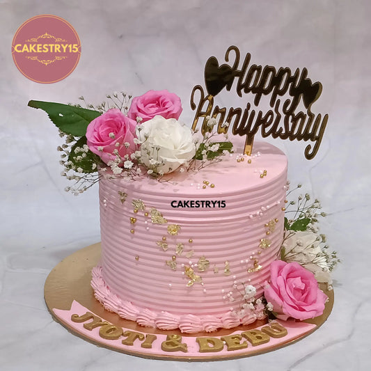 1kg strawberry anniversary cake topped with roses and baby breath from Cakestry15 Noida