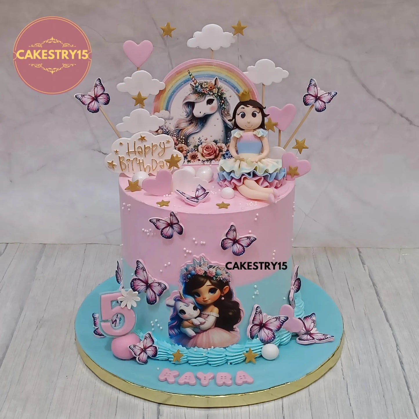 2kg pineapple unicorn birthday cake with girl figurine and edible unicorns from Cakestry15