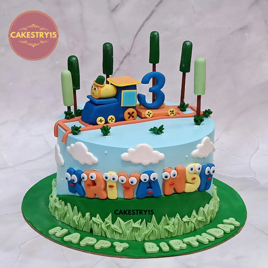2kg butterscotch train theme cake with fondant train, tracks, poles, clouds, grass, and 3D name by Cakestry15