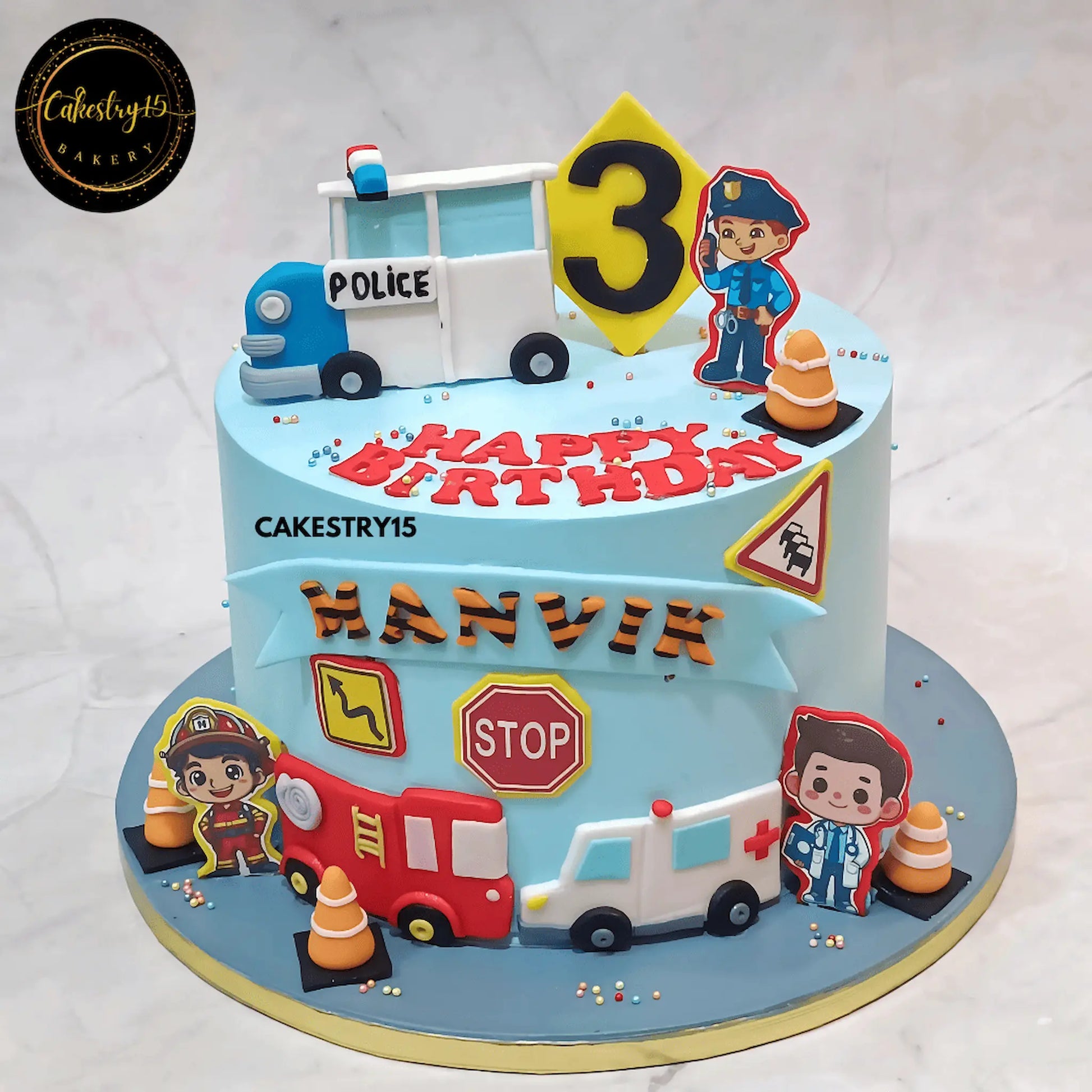 2kg pineapple birthday cake featuring an edible policeman, fireman, and doctor with their vehicles for a 3rd birthday celebration by cakestry15 noida