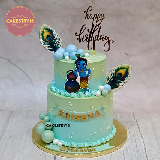 Little Krishna-themed 3kg choco vanilla cake with edible Krishna image and peacock feather design by cakestry15