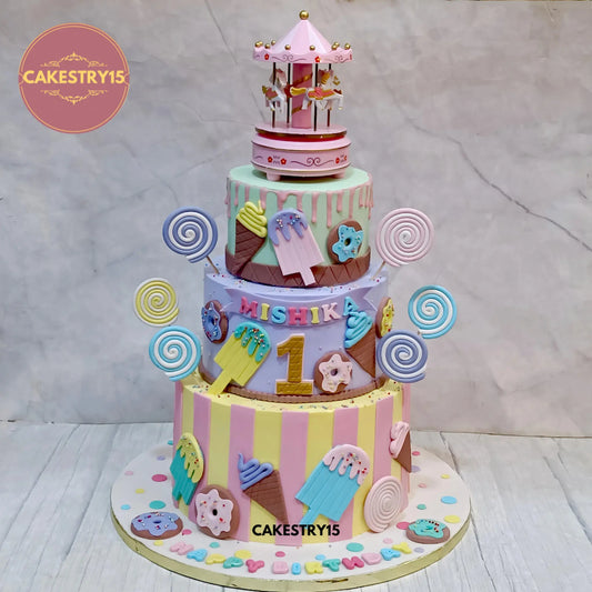 6kg chocolate 3-tier birthday cake with carousel topper, candy swirls, and donuts from Cakestry15