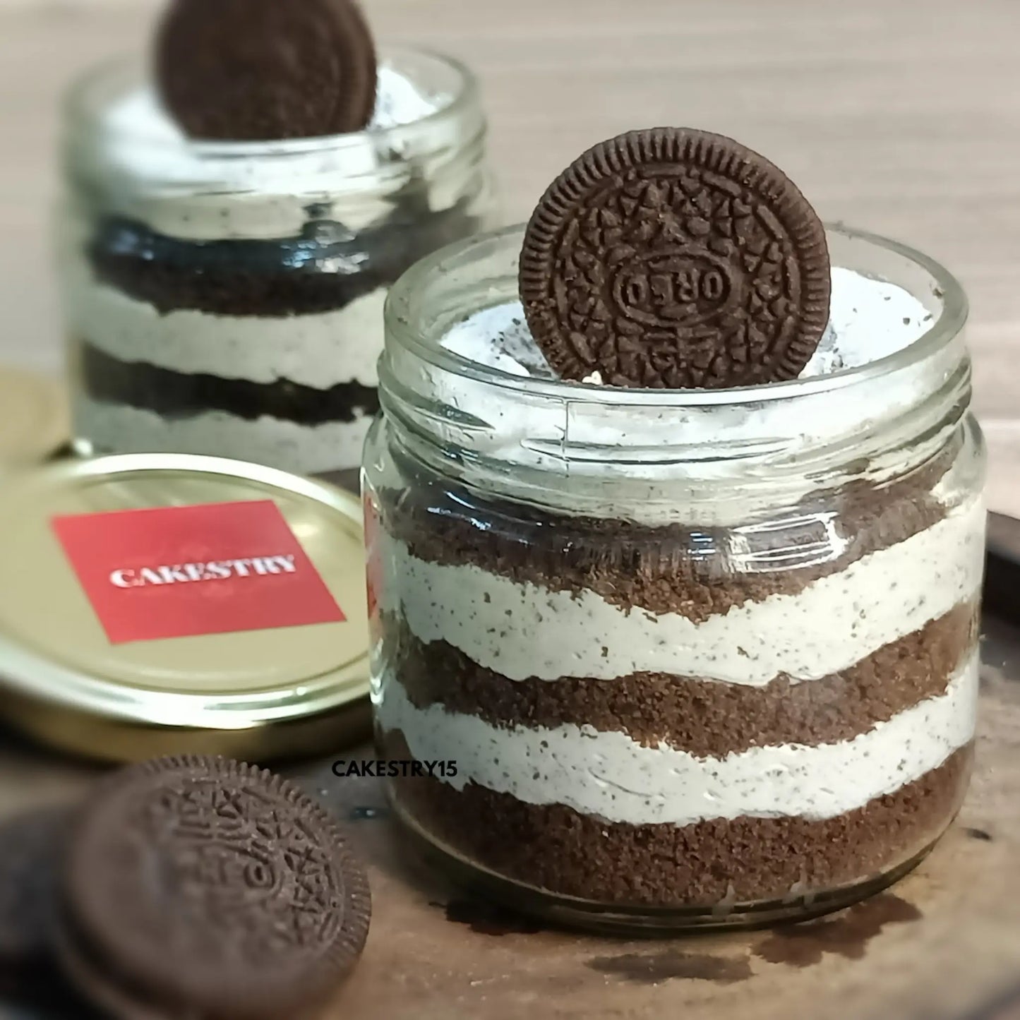 Eggless Oreo cake jar with biscuit layers from Cakestry15, perfect for events and gifting