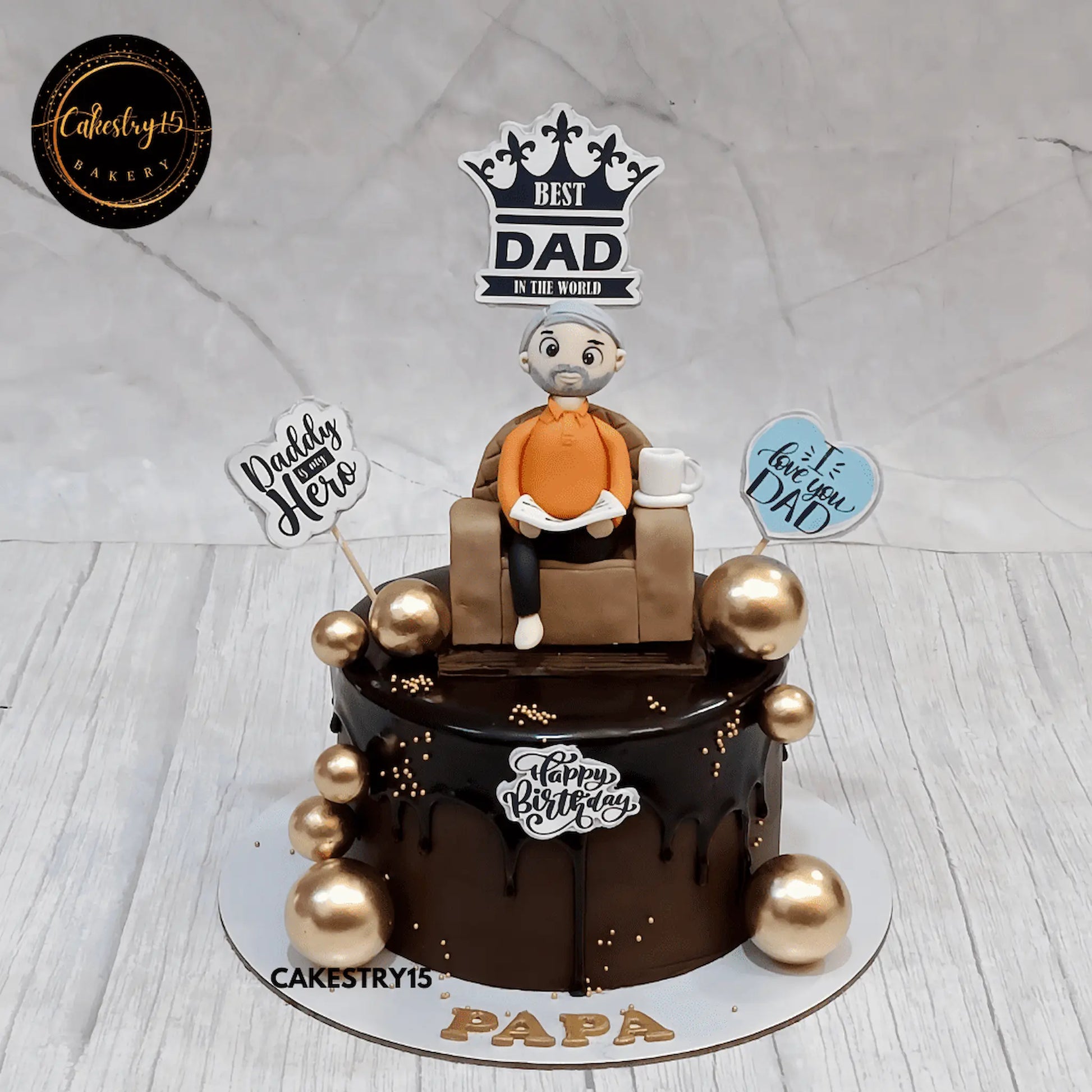Chocolate birthday cake for papa with newspaper figurine by cakestry15 best bakery noida