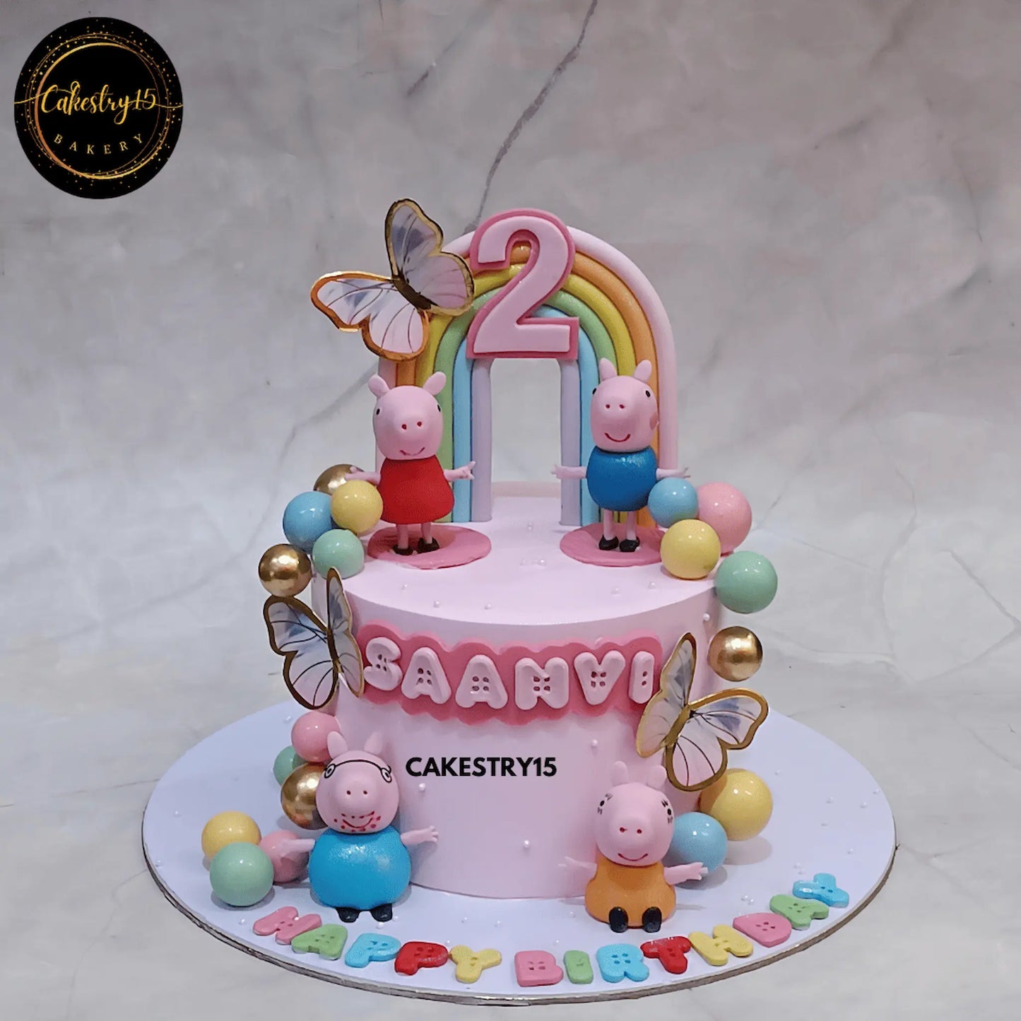 Peppa Pig themed 2nd birthday cake with rainbow and pineapple flavor for Saanvi by cakestry15 noida